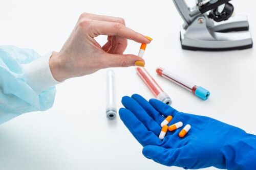 man-hazmat-suit-with-medicine-pills_23-2148483256 man-hazmat-suit-with-medicine-pills_23-2148483256
