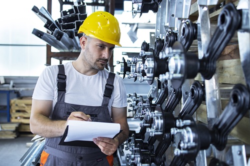 industrial-employee-wearing-uniform-yellow-hardhat-checking-production-factory industrial-employee-wearing-uniform-yellow-hardhat-checking-production-factory