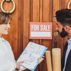 workmates-talking-about-house-s-plan