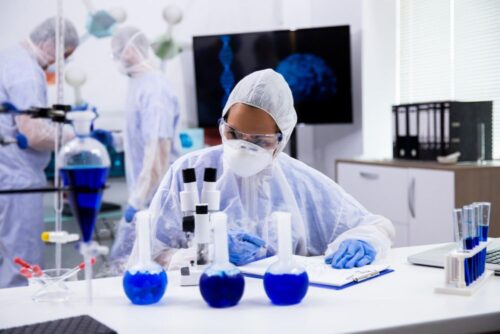 female-scientist-protection-equipment-taking-notes-with-smoking-blue-solution-test-tubes (1) female-scientist-protection-equipment-taking-notes-with-smoking-blue-solution-test-tubes (1)
