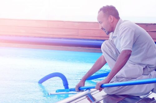 bigstock-pool-cleaner-during-his-work-249174202-700x466 bigstock-pool-cleaner-during-his-work-249174202-700x466