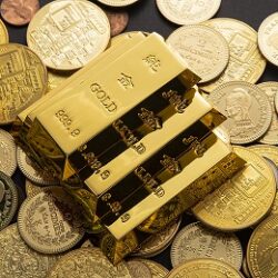 closeup-shot-pile-shiny-gold-coins-bars
