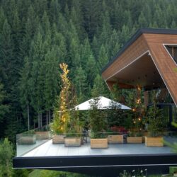 modern-wooden-house-mountains-terrace-with-panoramic-view_169016-69002